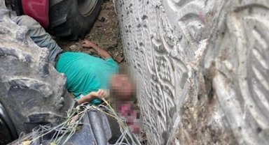 Kullandığı traktörün altında kalan çiftçi ağır yaralandı
