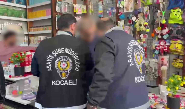 10 yıldır aranan firari dükkanında yakalandı, kelepçeye itiraz etti